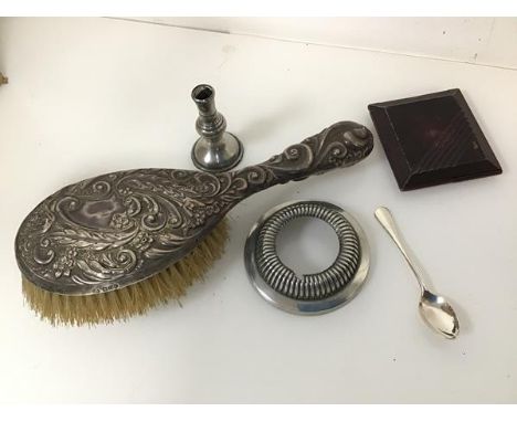 A mixed lot including an Edwardian Sheffield silver backed hairbrush (26cm x 9cm), a taper stick, a compact etc. (5)