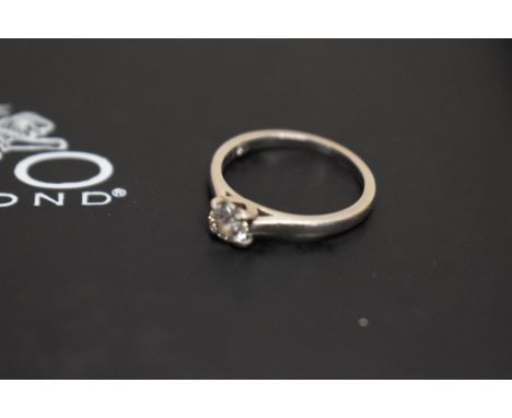 A white metal (thought to be platinum) diamond set solitaire ring, the brilliant cut diamond measuring 0.37ct approximately, 