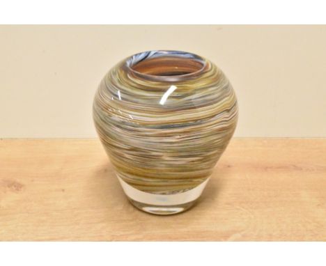 A heavy and decorative art glass vase, of tapering form and decorated with close packed swirls, most likely Italian, possibly
