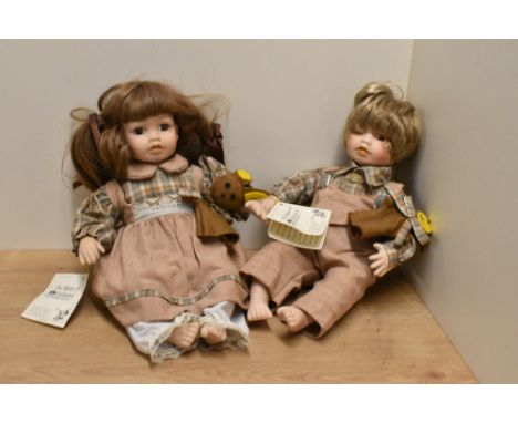 Two House of Valentina bisque porcelain headed dolls 'Ginger Bread Girl' and 'Ginger Bread Boy' each with padded torso's and 
