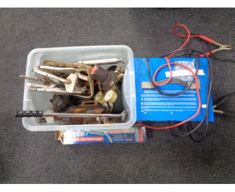 A Draper BCS200 battery charger together with a plastic crate containing suction pump, clamp, compressor, tools etc     