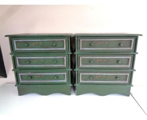 Two contemporary painted three drawer chests together with a painted wooden caddy  