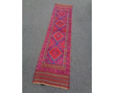 A Meshwani runner, 247cm by 63cm