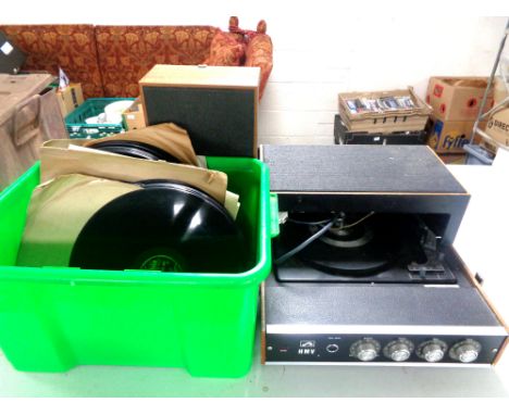A mid 20th century HMV tabletop electric record player together with a crate containing 78s 
