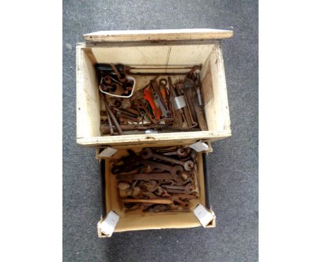 A painted crate and a box containing assorted hand tools to include ring spanners, files etc  