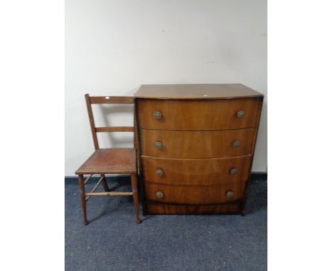 An Edwardian bedroom chair together with a mid 20th century walnut bow fronted four drawer chest   