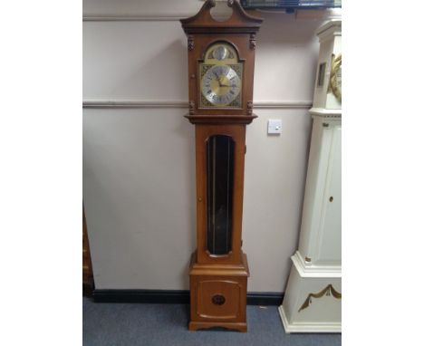 An Artime Tempus Fugit longcase clock with pendulum and weights 