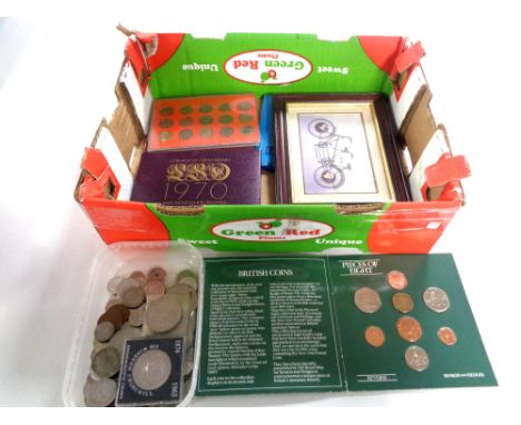 A box of assorted coinage, Britain's first decimal coin set, crowns, foreign coins etc 