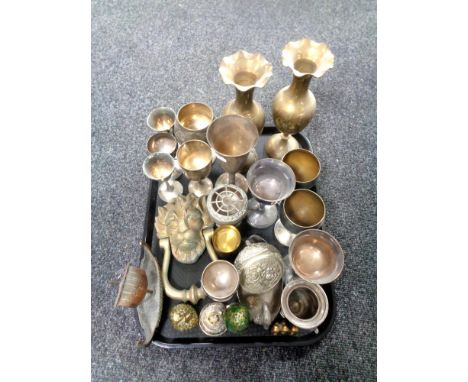 A tray containing assorted metal ware to include a lion mask door knocker, pair of brass Eastern vases, plated goblets etc   