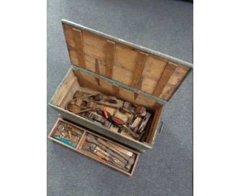 A 20th century pine joiner's tool box containing joinery tools to include block planes, whisk drill, chisels, hammer etc  