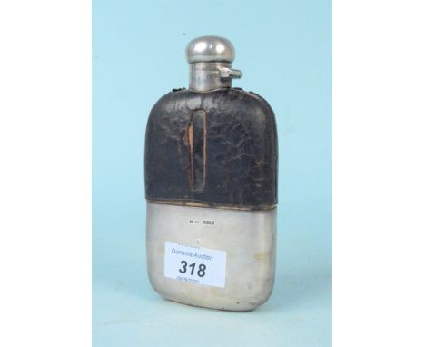 A silver and glass hip flask with leather top (as found), hallmarked Sheffield 1924