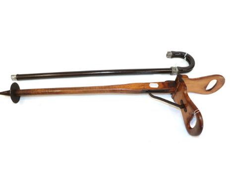 An Edwardian Satin Birch Shooting Stick, 83cm long; and A 1930's Metal Shooting Stick, 77cm long (2)