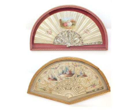 Two Framed and Glazed Folding Hand Fans, comprising a mid-18th century example with ivory monture, the upper guard with delic