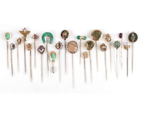 Twenty-Two Stick Pins, including a moss agate example, an amethyst thistle example, other amethyst examples; agate and other 