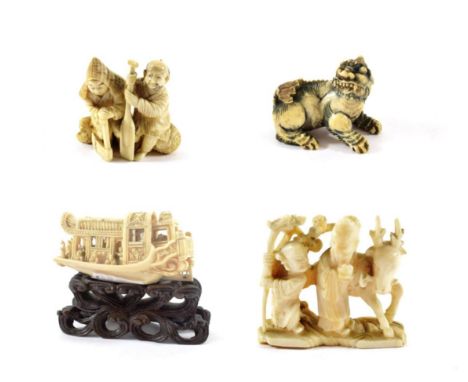 A Japanese Ivory Netsuke, Meiji period, as a crouching lion dog, 5cm long; A Similar Model of a Boat, 7cm long, with hardwood