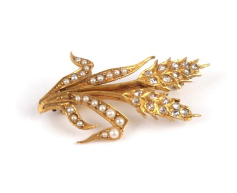 A Diamond and Seed Pearl Wheatsheaf Brooch, set with rose cut diamonds and split seed pearls, length 3.7cm, cased .  The broo