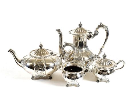 An Elizabeth II Four-Piece Silver Tea and Coffee-Service, by Frank Hawker Ltd., Birmingham, 1975, of compressed melon fluted 