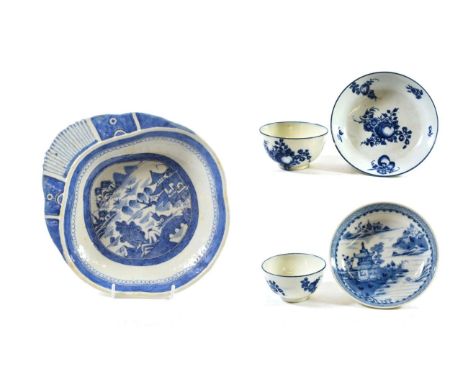 A Chinese Porcelain Shell Dish, Jiajing, painted in underglaze blue with a river landscape, 26.5cm wide; A Pair of Caughley T