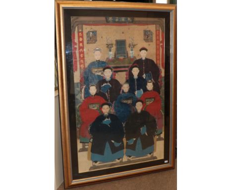 Chinese School (Qing Dynasty) An Ancestor Portrait, depicting nine seated figures before a table with two vases and a table s