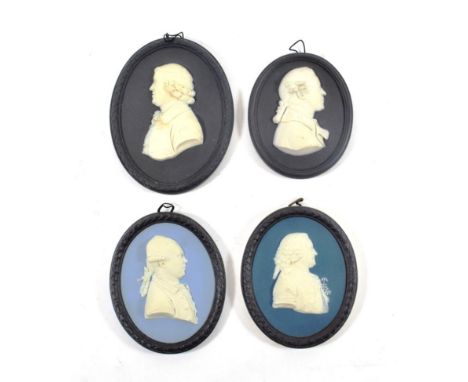 A Wedgwood Jasper Portrait Medallion, 19th century, with a bust portrait of Carl Linnaeus on a blue ground within a black bor