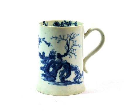 A Worcester Porcelain Mug, circa 1755, painted in underglaze blue with The Prunus Root pattern, workman's mark in underglaze 