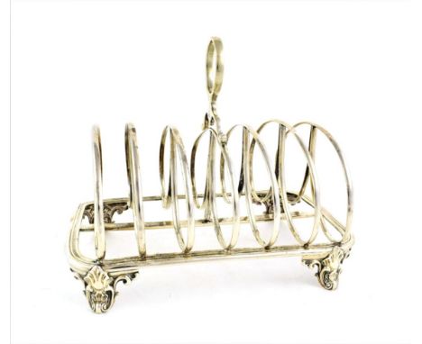 A William IV Silver Toast-Rack, Maker's Mark  Worn, Possibly Reily and Storer, London, 1837, rounded rectangular with seven b