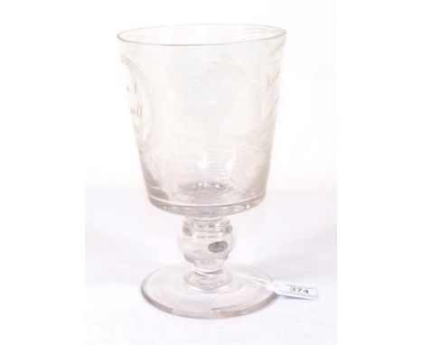 A Victorian Glass Coin Goblet, dated 1863, the bucket shaped bowl engraved with a portrait of a sailing ship inscribed Jane o