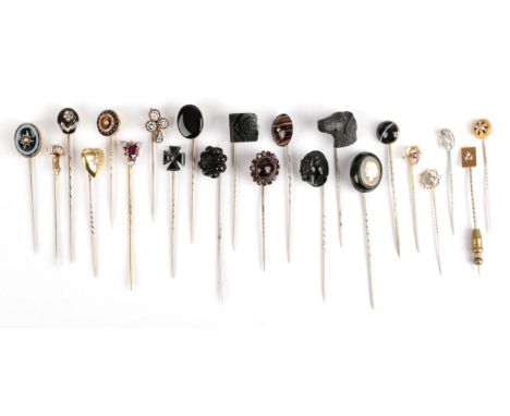 Twenty-Two Stick Pins, including agate examples; a dog's head example; gem set examples etc   Provenance: Private North East 