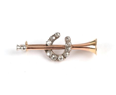 A Hunting Horn and Horseshoe Stock Pin, circa 1900, the horn formed of three colours of gold, with an old cut diamond set hor