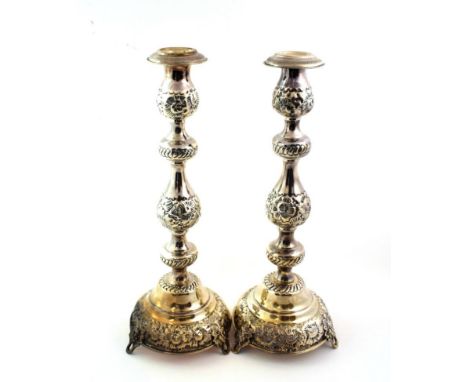 A Pair of George V Silver Sabbath-Candlesticks, by Jacob Rosenzweig, London, 1918, The Nozzles 1919, of typical form with flo