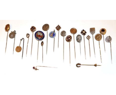 Twenty-Two Stick Pins, including a ruby diamond and pearl example, a garnet and split pearl example, coin examples, other gem