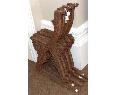 Two Pairs of Early Gothic Revival Cast Iron Bench Ends, in the manner of A W N Pugin, mid 19th century, with leaf scroll deco