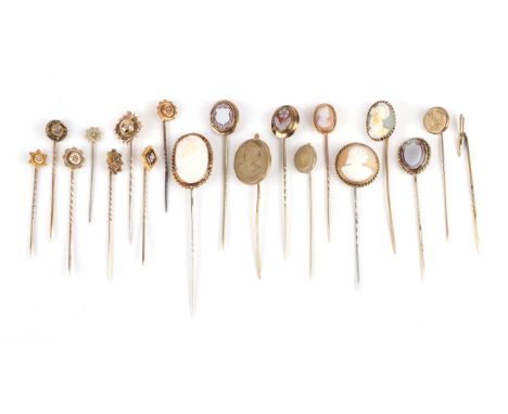 Nineteen Stick Pins, including a pen nib example, cased; ten shell, agate and lava cameo examples; and eight others   Provena