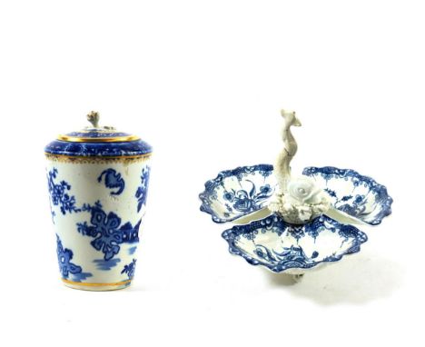 A Worcester Porcelain Triple Shell Sweetmeat Stand, circa 1770, with dolphin finial, painted in underglaze blue with The Swee