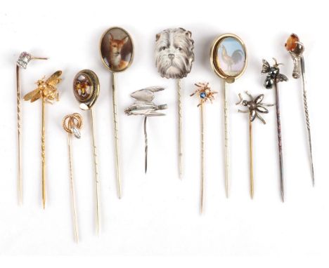 Twelve Stick Pins; including a diamond set bird example, cased, four bug examples, a snake head, a fox head Essex crystal pin