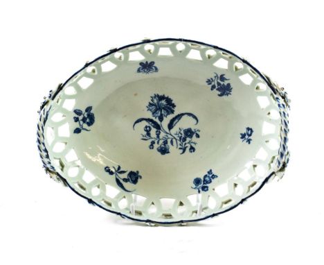 A Worcester Porcelain Oval Basket, circa 1775, with twin handles, printed in underglaze blue with The Gilliflower pattern and