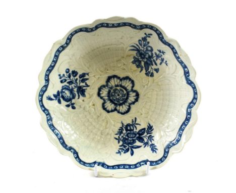 A Worcester Porcelain Junket Dish, circa 1765, printed in underglaze blue with The Natural Sprays pattern within a cell borde