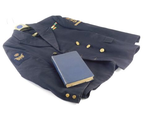 A Royal Navy jacket (Arctic convoys) and a Manual Of Seamanship book. (2)