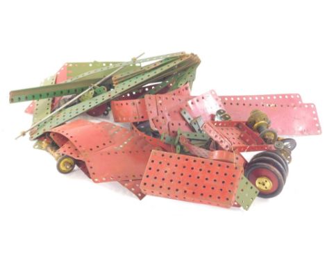 Various vintage Meccano, to include cog wheel, 15cm diameter, various other bits, mainly in red and green. (a quantity)
