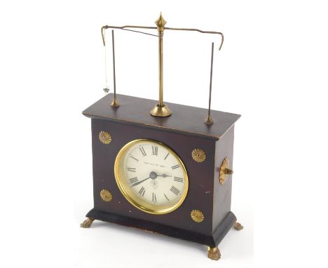 A Horolovar pendulum type mantle clock, the 9cm diameter, Roman numeric dial stamped Pat Oct 9th 1883, on hairy paw feet, 27c