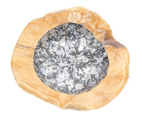 A treen bowl, with butterfly mother of pearl style centre, 38cm wide. 