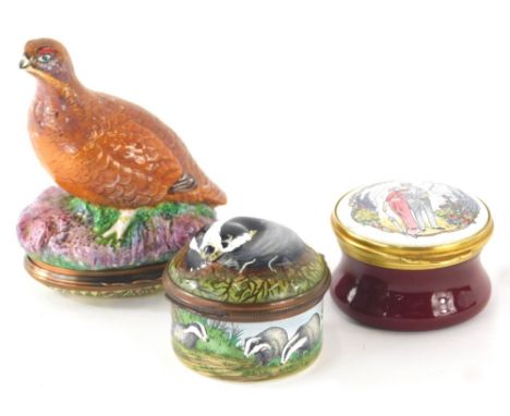 An enamel patch box, Halcyon Days enamel box, with badger lid, 4cm wide, and another enamel style box with pottery grouse lid