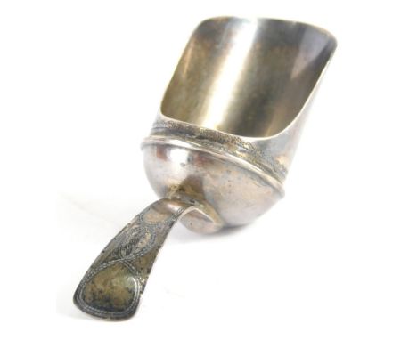 A George III silver caddy spoon, old English pattern with bright cut handle and shaped bowl, Birmingham 1805, 6cm wide.