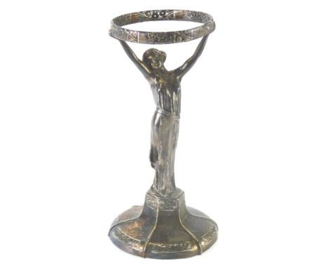 A 20thC Art Nouveau silver plated lamp base, formed as a lady in flowing robes on a shaped base, unsigned, 33cm high.