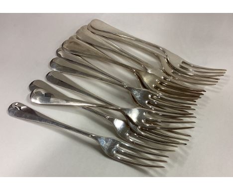 A set of twelve silver OE pattern dessert forks. Sheffield. By R&B. Approx. 380 grams. Est. £300 - £400.