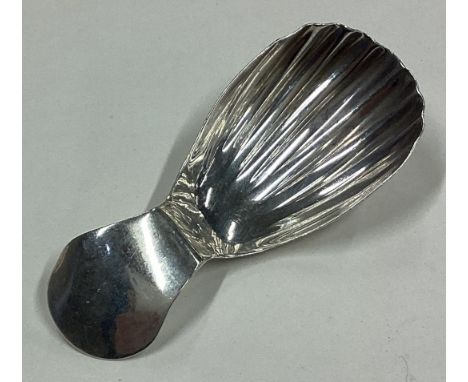 A Modernistic silver caddy spoon. Birmingham. Approx. 12 grams. Est. £20 - £30.