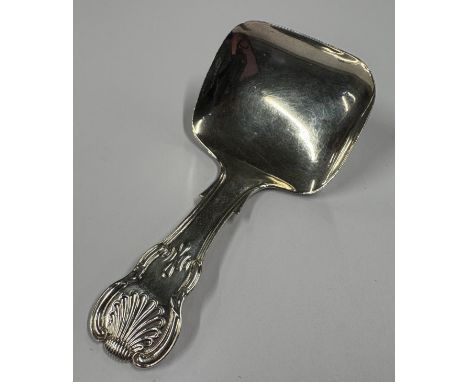 A Georgian silver honeysuckle pattern caddy spoon. Birmingham. By WW. Approx. 13 grams. Est. £30 - £40.