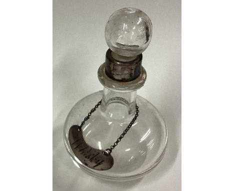 A silver mounted glass whisky noggin. Birmingham 1906. Est. £50 - £80.