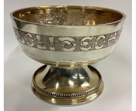 EDINBURGH: A novelty silver gilt communion bowl with engraved decoration. 1930. By Hamilton & Inches. Approx. 310 grams. Est.