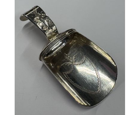 A good Georgian silver caddy spoon. London. By C&C. Approx. 8 grams. Est. £20 - £30.